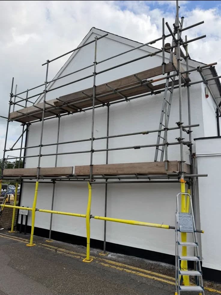 Gable render repaired and repainted – after