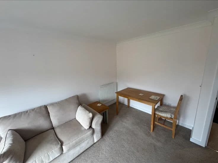 Feature wall painted out in white – after