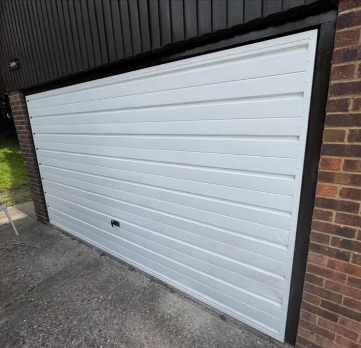 Garage door stripped and repainted – after